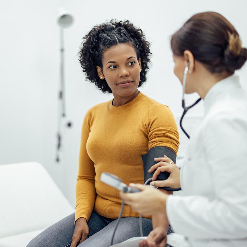 patient talking to doctor