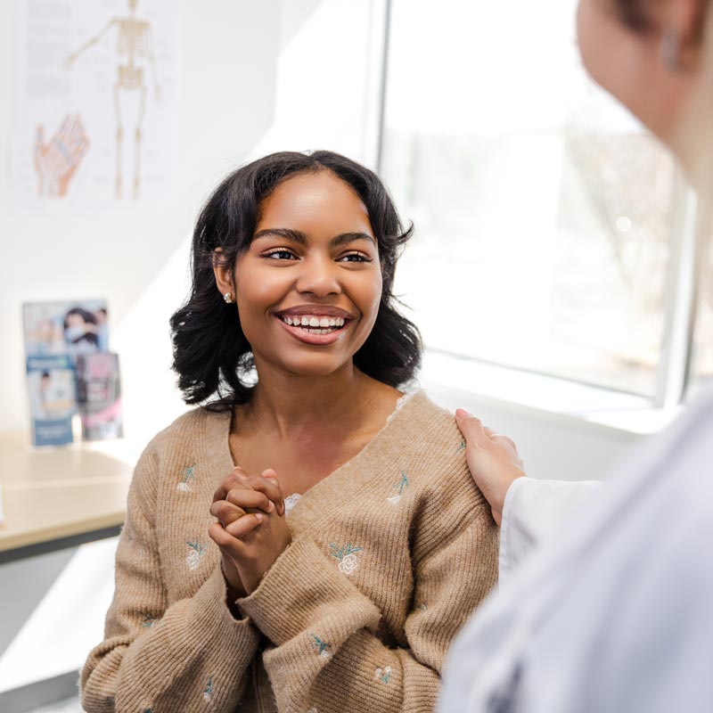 patient talking to doctor